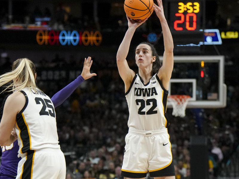 Apr 2, 2023; Dallas, TX, USA; Iowa Hawkeyes guard Caitlin Clark (22) attempts a three-point basket against the LSU Lady Tigers in the first half during the final round of the Women's Final Four NCAA tournament at the American Airlines Center. Mandatory Credit: Kirby Lee-USA TODAY Sports