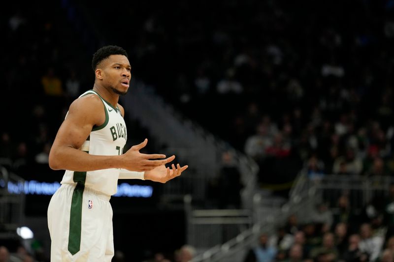 MILWAUKEE, WISCONSIN - JANUARY 08: Giannis Antetokounmpo #34 of the Milwaukee Bucks reacts in the first half against the Utah Jazz at Fiserv Forum on January 08, 2024 in Milwaukee, Wisconsin. NOTE TO USER: User expressly acknowledges and agrees that, by downloading and or using this photograph, User is consenting to the terms and conditions of the Getty Images License Agreement. (Photo by Patrick McDermott/Getty Images)