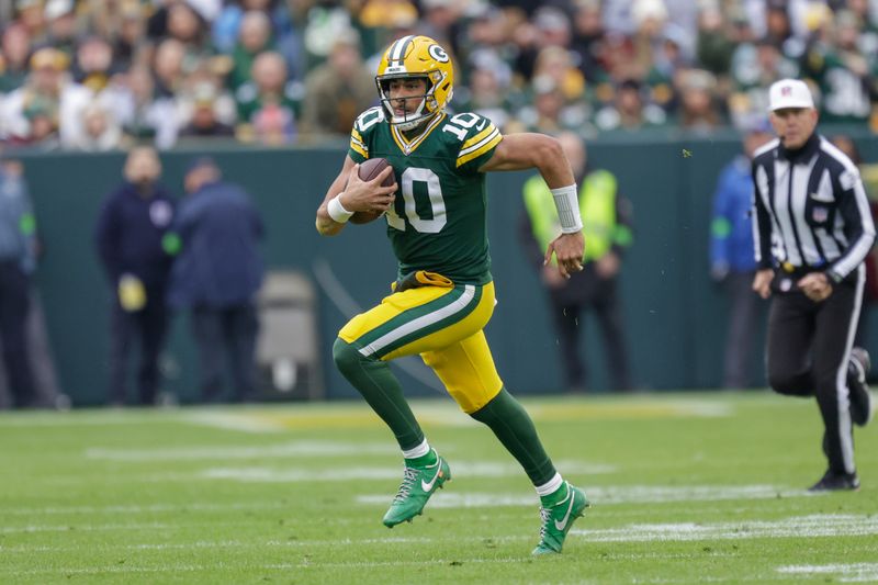 Green Bay Packers quarterback Jordan Love (10) scrambles out of the pocket during an NFL football game between the Green Bay Packers and Los Angeles Rams Sunday, Nov. 5, 2023, in Green Bay, Wis. (AP Photo/Matt Ludtke)