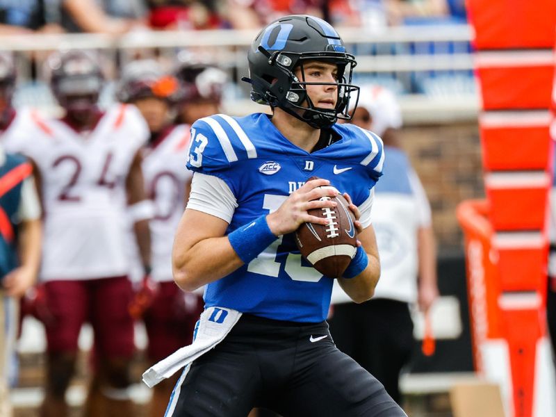 Nov 12, 2022; Durham, North Carolina, USA;  Duke Blue Devils quarterback Riley Leonard (13) runs with the ball during the first half against Virginia Tech at Wallace Wade Stadium. Mandatory Credit: Jaylynn Nash-USA TODAY Sports