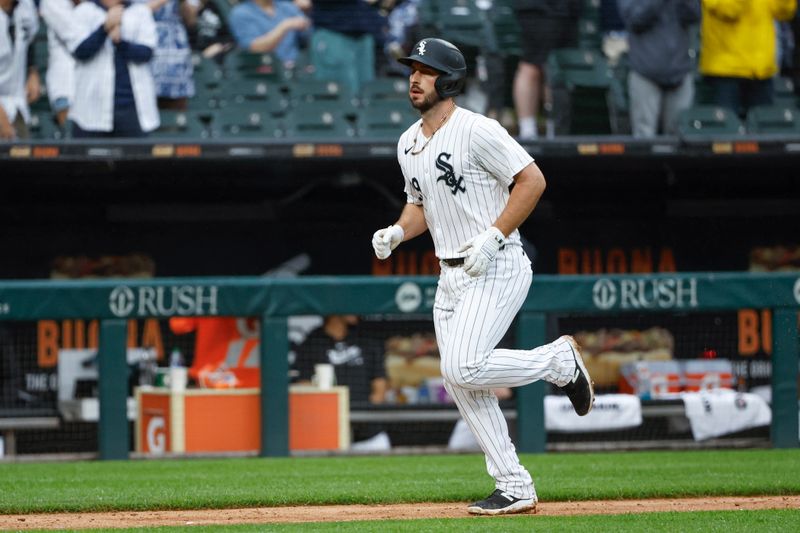 Jun 8, 2024; Chicago, Illinois, USA; Chicago White Sox shortstop Paul DeJong (29) rounds the bases after hitting a solo home run against the Boston Red Sox during the seventh inning at Guaranteed Rate Field. Mandatory Credit: Kamil Krzaczynski-USA TODAY Sports