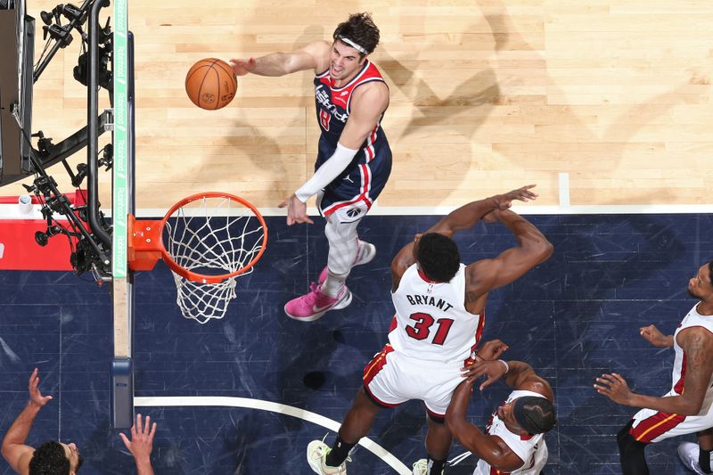 WASHINGTON, DC -? MARCH 31: Deni Avdija #8 of the Washington Wizards drives to the basket during the game against the Miami Heat on March 31, 2024 at Capital One Arena in Washington, DC. NOTE TO USER: User expressly acknowledges and agrees that, by downloading and or using this Photograph, user is consenting to the terms and conditions of the Getty Images License Agreement. Mandatory Copyright Notice: Copyright 2024 NBAE (Photo by Stephen Gosling/NBAE via Getty Images)