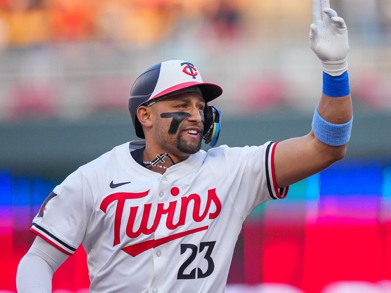 Aug 12, 2024; Minneapolis, Minnesota, USA; Minnesota Twins third base Royce Lewis (23) celebrates his home run against the Kansas City Royals in the second inning at Target Field. Mandatory Credit: Brad Rempel-USA TODAY Sports