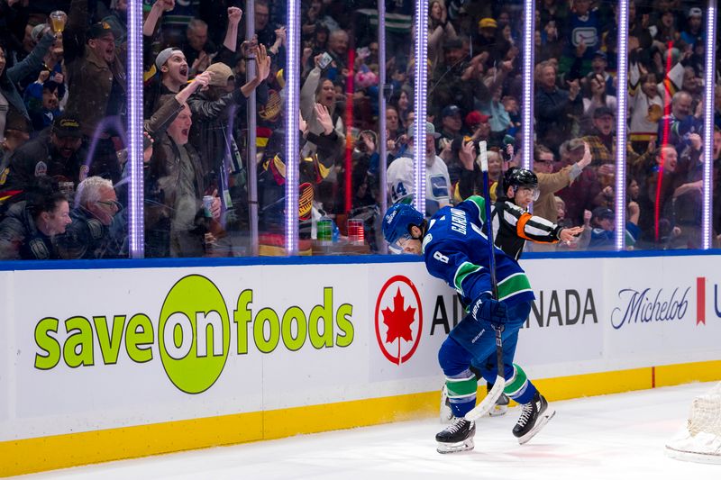 Apr 8, 2024; Vancouver, British Columbia, CAN;  Vancouver Canucks forward Conor Garland (8) celebrates his goal against the Vegas Golden Knights in the first period  at Rogers Arena. Mandatory Credit: Bob Frid-USA TODAY Sports