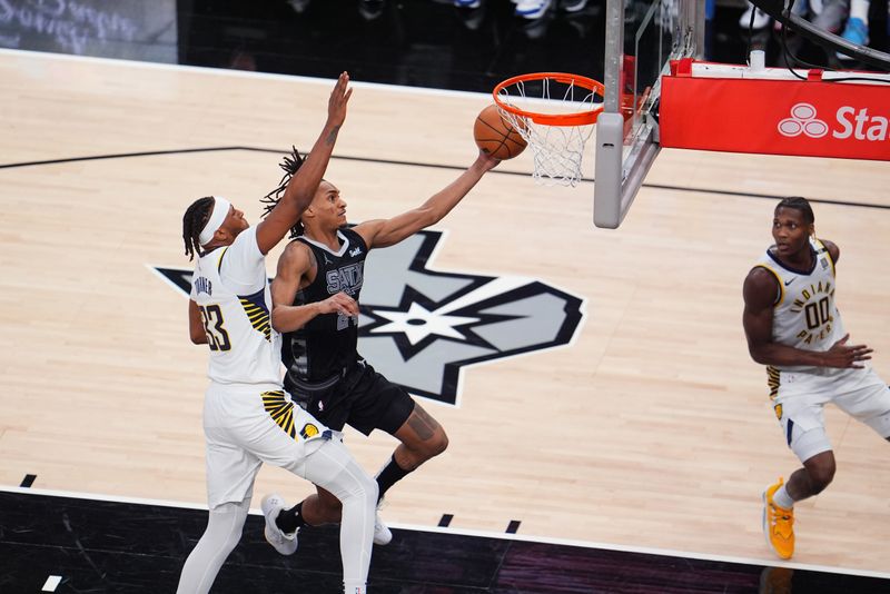 SAN ANTONIO, TX - MARCH 3: Devin Vassell #24 of the San Antonio Spurs drives to the basket during the game against the Indiana Pacers on March 3, 2024 at the AT&T Center in San Antonio, Texas. NOTE TO USER: User expressly acknowledges and agrees that, by downloading and or using this photograph, user is consenting to the terms and conditions of the Getty Images License Agreement. Mandatory Copyright Notice: Copyright 2024 NBAE (Photos by Cooper Neill/NBAE via Getty Images)