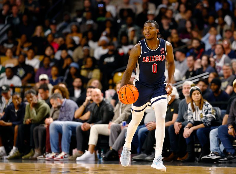 Jan 17, 2026; Orlando, Florida, USA;  Arizona Wildcats guard Jaden Bradley (0) dribbles up the court in the second half against the Central Florida Knights at Addition Financial Arena. Mandatory Credit: Russell Lansford-Imagn Images