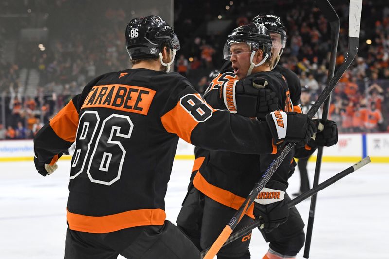 Oct 31, 2024; Philadelphia, Pennsylvania, USA; Philadelphia Flyers right wing Bobby Brink (10) celebrates his goal with left wing Joel Farabee (86) and defenseman Rasmus Ristolainen (55) against the St. Louis Blues during the third period at Wells Fargo Center. Mandatory Credit: Eric Hartline-Imagn Images