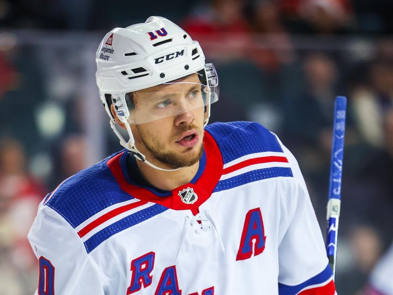 Oct 24, 2023; Calgary, Alberta, CAN; New York Rangers left wing Artemi Panarin (10) skates during the first period against the Calgary Flames at Scotiabank Saddledome. Mandatory Credit: Sergei Belski-USA TODAY Sports