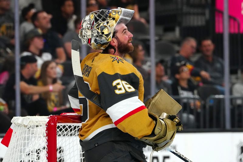 Sep 29, 2023; Las Vegas, Nevada, USA; Vegas Golden Knights goaltender Logan Thompson (36) awaits a faceoff against the Arizona Coyotes during the first period at T-Mobile Arena. Mandatory Credit: Stephen R. Sylvanie-USA TODAY Sports