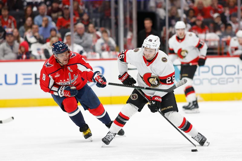 Apr 7, 2024; Washington, District of Columbia, USA; Ottawa Senators defenseman Erik Brannstrom (26) shoots the puck as Washington Capitals left wing Alex Ovechkin (8) defends in the second period at Capital One Arena. Mandatory Credit: Geoff Burke-USA TODAY Sports