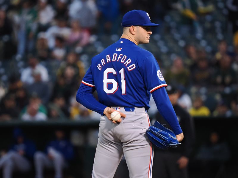 Sep 25, 2024; Oakland, California, USA; Texas Rangers starting pitcher Cody Bradford (61) on the mound against the Oakland Athletics during the first inning at Oakland-Alameda County Coliseum. Mandatory Credit: Kelley L Cox-Imagn Images