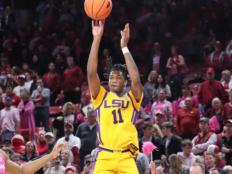 Jan 24, 2023; Fayetteville, Arkansas, USA; LSU Tigers guard Justice Williams (11) attempts a three point shot in the second half against the Arkansas Razorbacks at Bud Walton Arena. Arkansas won 60-40. Mandatory Credit: Nelson Chenault-USA TODAY Sports