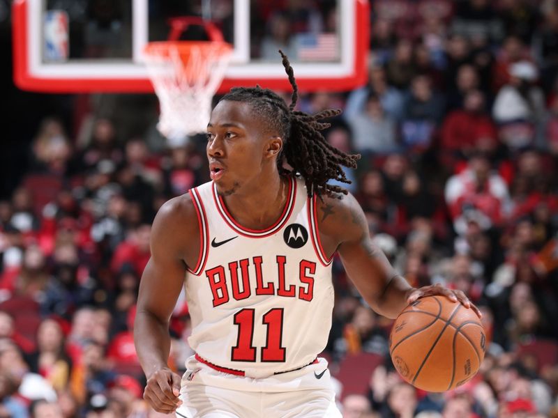 CHICAGO, IL - DECEMBER 2: Ayo Dosunmu #11 of the Chicago Bulls dribbles the ball during the game against the Brooklyn Nets on December 2, 2024 at United Center in Chicago, Illinois. NOTE TO USER: User expressly acknowledges and agrees that, by downloading and or using this photograph, User is consenting to the terms and conditions of the Getty Images License Agreement. Mandatory Copyright Notice: Copyright 2024 NBAE (Photo by Jeff Haynes/NBAE via Getty Images)