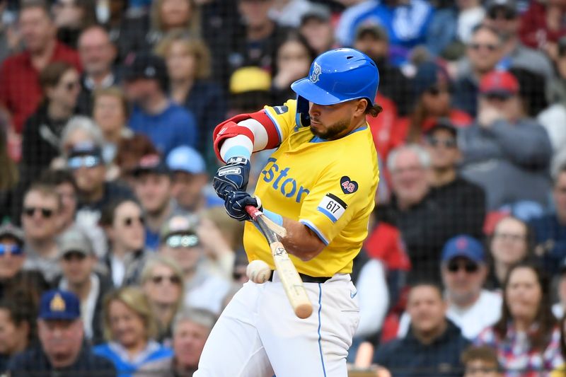 Apr 27, 2024; Boston, Massachusetts, USA;  Boston Red Sox right fielder Wilyer Abreu (52) hits an infield RBI single during the fifth inning against the Chicago Cubs at Fenway Park. Mandatory Credit: Bob DeChiara-USA TODAY Sports