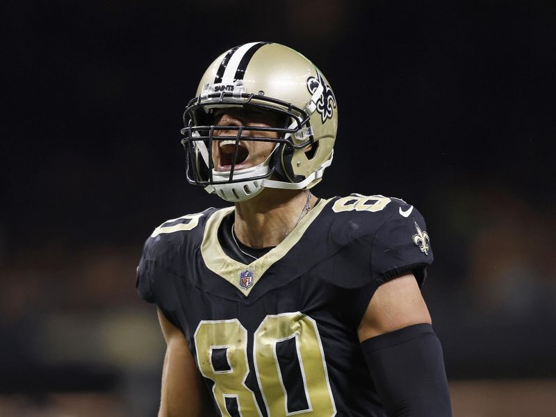 New Orleans Saints tight end Jimmy Graham (80) reacts after making a completion for a first down during an NFL preseason football game against the Houston Texans, Sunday, Aug. 27, 2023, in New Orleans. (AP Photo/Tyler Kaufman)