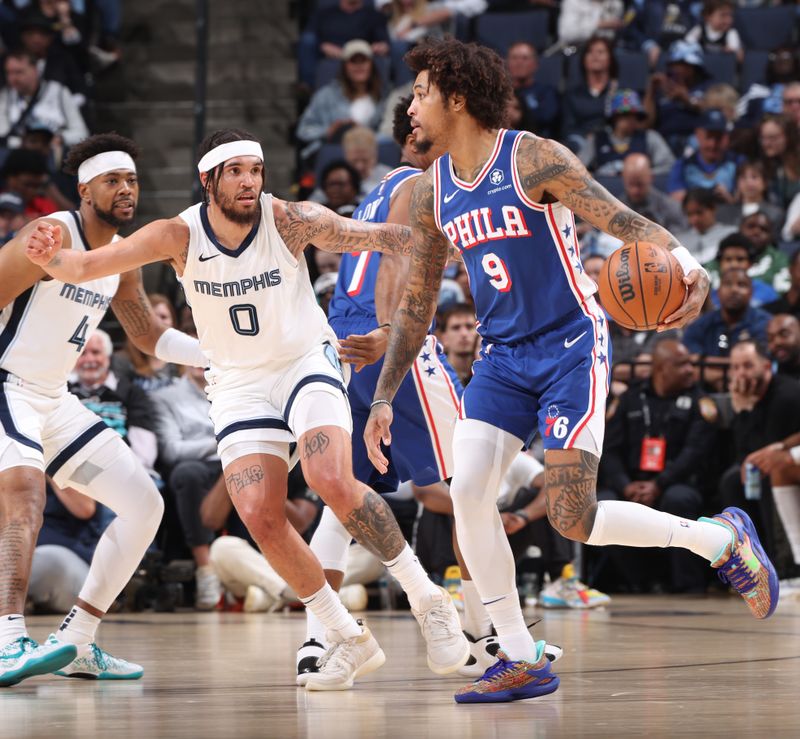 MEMPHIS, TN - APRIL 6: Timmy Allen #0 of the Memphis Grizzles plays defense against Kelly Oubre Jr. #9 of the Philadelphia 76ers on April 6, 2024 at FedExForum in Memphis, Tennessee. NOTE TO USER: User expressly acknowledges and agrees that, by downloading and or using this photograph, User is consenting to the terms and conditions of the Getty Images License Agreement. Mandatory Copyright Notice: Copyright 2024 NBAE (Photo by Joe Murphy/NBAE via Getty Images)