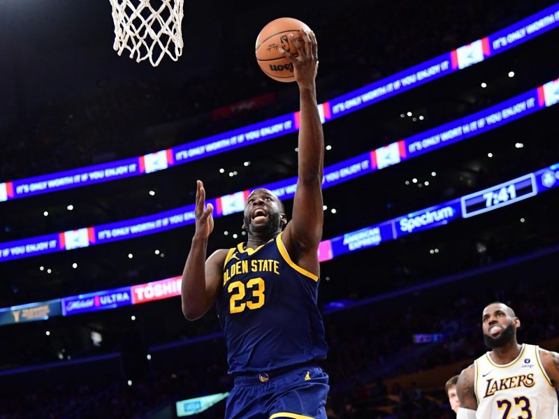 LOS ANGELES, CA - MACH 16: Draymond Green #23 of the Golden State Warriors drives to the basket during the game against the Los Angeles Lakers on March 16, 2024 at Crypto.Com Arena in Los Angeles, California. NOTE TO USER: User expressly acknowledges and agrees that, by downloading and/or using this Photograph, user is consenting to the terms and conditions of the Getty Images License Agreement. Mandatory Copyright Notice: Copyright 2024 NBAE (Photo by Adam Pantozzi/NBAE via Getty Images)