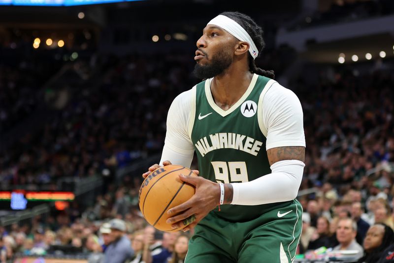 MILWAUKEE, WISCONSIN - FEBRUARY 09: Jae Crowder #99 of the Milwaukee Bucks takes a shot during a game against the Charlotte Hornets at Fiserv Forum on February 09, 2024 in Milwaukee, Wisconsin. NOTE TO USER: User expressly acknowledges and agrees that, by downloading and or using this photograph, User is consenting to the terms and conditions of the Getty Images License Agreement. (Photo by Stacy Revere/Getty Images)