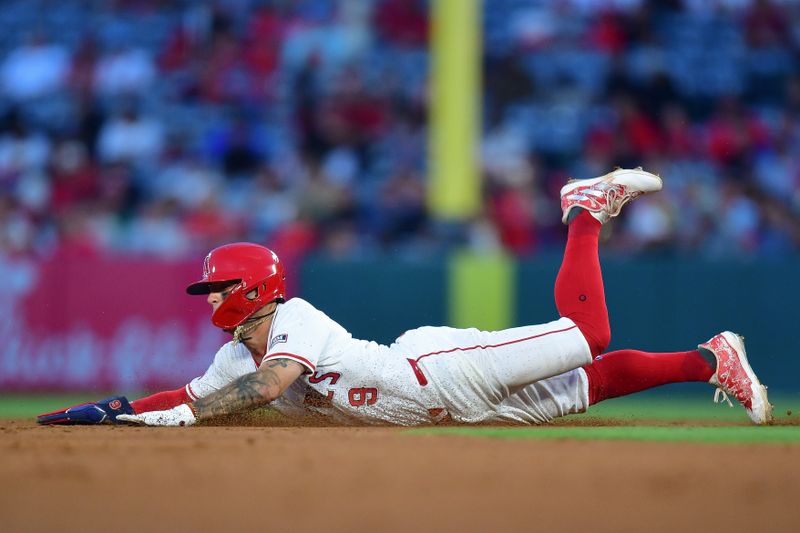 Jun 27, 2024; Anaheim, California, USA; Los Angeles Angels shortstop Zach Neto (9) steals second against the Detroit Tigers during the sixth inning at Angel Stadium. Mandatory Credit: Gary A. Vasquez-USA TODAY Sports
