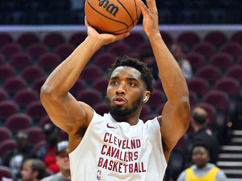 CLEVELAND, OHIO - NOVEMBER 25: Donovan Mitchell #45 of the Cleveland Cavaliers warms up prior to the game against the Los Angeles Lakers at Rocket Mortgage Fieldhouse on November 25, 2023 in Cleveland, Ohio. NOTE TO USER: User expressly acknowledges and agrees that, by downloading and or using this photograph, User is consenting to the terms and conditions of the Getty Images License Agreement. (Photo by Jason Miller/Getty Images)