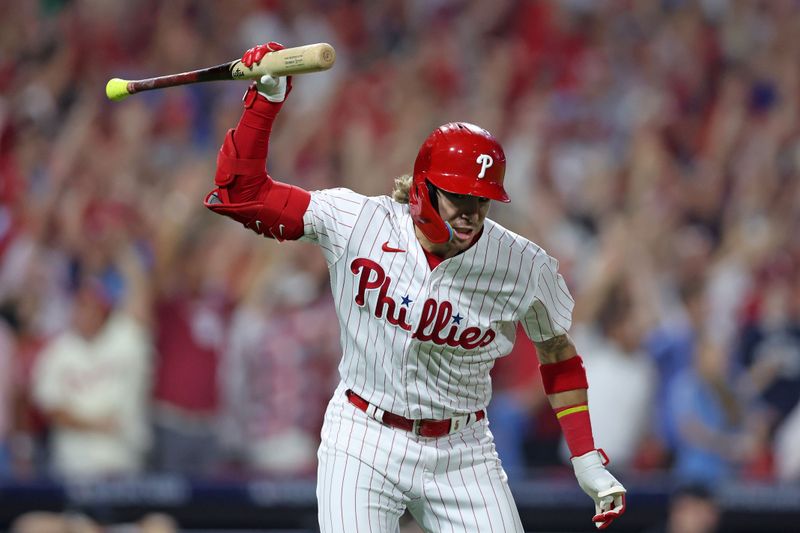 Oct 4, 2023; Philadelphia, Pennsylvania, USA; Philadelphia Phillies second baseman Bryson Stott (5) reacts after hitting  a grand slam against the Miami Marlins during the sixth inning for game two of the Wildcard series for the 2023 MLB playoffs at Citizens Bank Park. Mandatory Credit: Bill Streicher-USA TODAY Sports