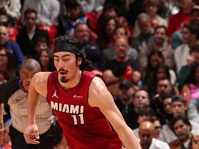 MIAMI, FL - DECEMBER 25:  Jaime Jaquez Jr. #11 of the Miami Heat goes to the basket during the game on December 25, 2023 at Kaseya Center Arena in Miami, Florida. NOTE TO USER: User expressly acknowledges and agrees that, by downloading and or using this Photograph, user is consenting to the terms and conditions of the Getty Images License Agreement. Mandatory Copyright Notice: Copyright 2023 NBAE (Photo by Issac Baldizon/NBAE via Getty Images)