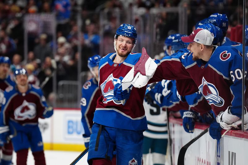 Dec 31, 2023; Denver, Colorado, USA; Colorado Avalanche right wing Valeri Nichushkin (13) celebrates his goal ahead goal with goaltender Ivan Prosvetov (50) in the third period against the San Jose Sharks at Ball Arena. Mandatory Credit: Ron Chenoy-USA TODAY Sports