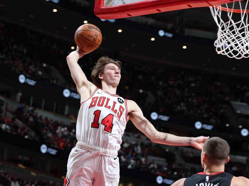 CHICAGO, IL - FEBRUARY 4:  Matas Buzelis #14 of Chicago Bulls dunks the ball during the game against the Miami Heat on February 4 2025 at United Center in Chicago, Illinois. NOTE TO USER: User expressly acknowledges and agrees that, by downloading and or using this photograph, User is consenting to the terms and conditions of the Getty Images License Agreement. Mandatory Copyright Notice: Copyright 2025 NBAE (Photo by Jeff Haynes/NBAE via Getty Images)