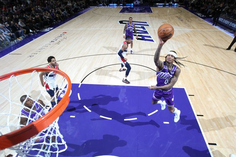 SALT LAKE CITY, UT - MARCH 4:  Jordan Clarkson #00 of the Utah Jazz drives to the basket during the game against the Washington Wizards on March 4, 2024 at vivint.SmartHome Arena in Salt Lake City, Utah. NOTE TO USER: User expressly acknowledges and agrees that, by downloading and or using this Photograph, User is consenting to the terms and conditions of the Getty Images License Agreement. Mandatory Copyright Notice: Copyright 2024 NBAE (Photo by Melissa Majchrzak/NBAE via Getty Images)