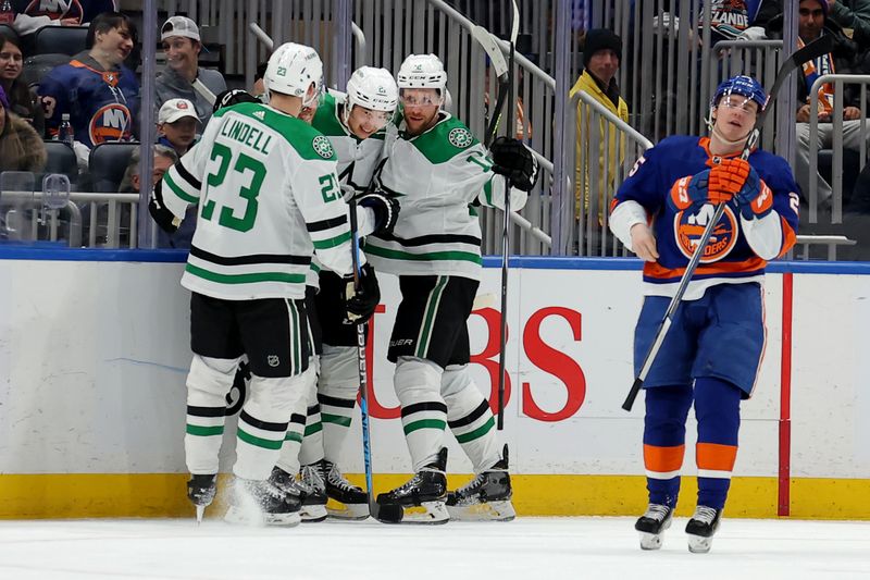 Jan 21, 2024; Elmont, New York, USA; Dallas Stars left wing Jason Robertson (21) celebrates his goal against the New York Islanders with teammates during the second period at UBS Arena. Mandatory Credit: Brad Penner-USA TODAY Sports