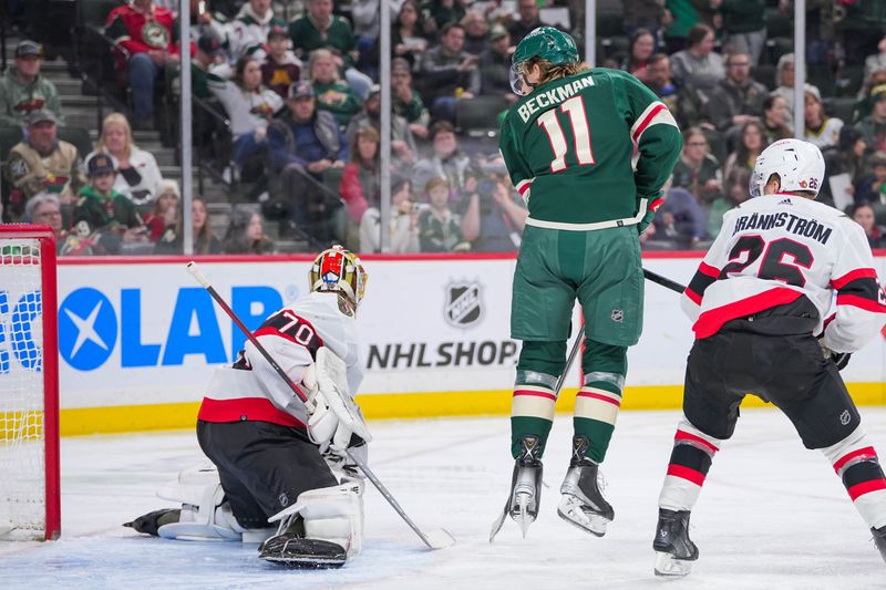 Apr 2, 2024; Saint Paul, Minnesota, USA; Minnesota Wild left wing Adam Beckman (11) screens Ottawa Senators goaltender Joonas Korpisalo (70) in the second period at Xcel Energy Center. Mandatory Credit: Brad Rempel-USA TODAY Sports