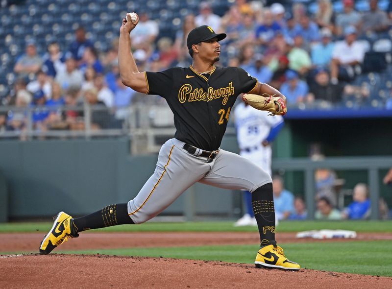 Aug 28, 2023; Kansas City, Missouri, USA;  Pittsburgh Pirates starting pitcher Johan Oviedo (24) delivers a pitch in the first inning against the Kansas City Royals at Kauffman Stadium. Mandatory Credit: Peter Aiken-USA TODAY Sports