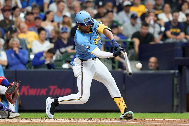 Jun 28, 2024; Milwaukee, Wisconsin, USA;  Milwaukee Brewers center fielder Blake Perkins (16) breaks his bat during the third inning against the Chicago Cubs at American Family Field. Mandatory Credit: Jeff Hanisch-USA TODAY Sports