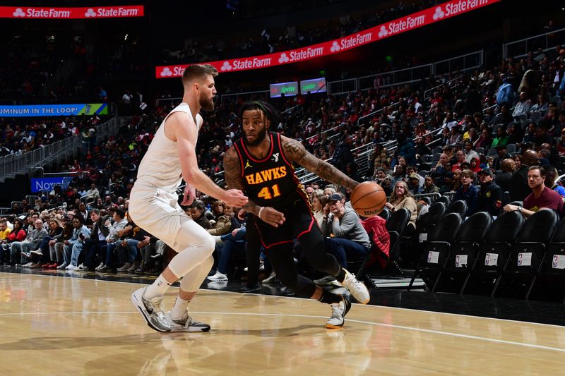 ATLANTA, GA - JANUARY 20: Saddiq Bey #41 of the Atlanta Hawks drives to the basket during the game against the Cleveland Cavaliers on January 20, 2024 at State Farm Arena in Atlanta, Georgia.  NOTE TO USER: User expressly acknowledges and agrees that, by downloading and/or using this Photograph, user is consenting to the terms and conditions of the Getty Images License Agreement. Mandatory Copyright Notice: Copyright 2024 NBAE (Photo by Scott Cunningham/NBAE via Getty Images)