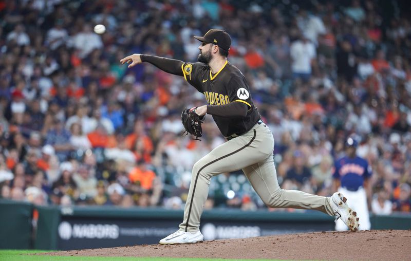 Sep 10, 2023; Houston, Texas, USA; San Diego Padres starting pitcher Matt Waldron (61) delivers a pitch during the first inning against the Houston Astros at Minute Maid Park. Mandatory Credit: Troy Taormina-USA TODAY Sports