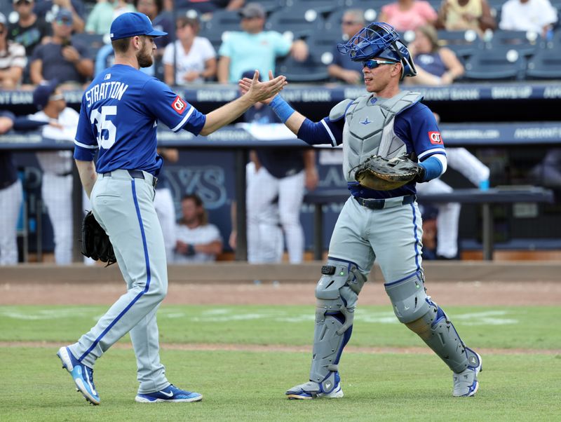 May 1, 2025; St. Petersburg, Florida, USA; Kansas City Royals pitcher Chris Stratton (35) and catcher Freddy Fermin (34) celebrate after they beat the Tampa Bay Rays  at George M. Steinbrenner Field. Mandatory Credit: Kim Klement Neitzel-Imagn Images