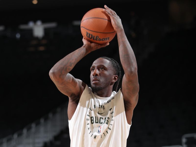 MILWAUKEE, WI - NOVEMBER 7: Taurean Prince #12 of the Milwaukee Bucks warms up before the game against the Utah Jazz on November 7, 2024 at Fiserv Forum Center in Milwaukee, Wisconsin. NOTE TO USER: User expressly acknowledges and agrees that, by downloading and or using this Photograph, user is consenting to the terms and conditions of the Getty Images License Agreement. Mandatory Copyright Notice: Copyright 2024 NBAE (Photo by Gary Dineen/NBAE via Getty Images).