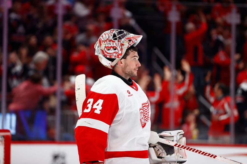 Mar 26, 2024; Washington, District of Columbia, USA; Detroit Red Wings goaltender Alex Lyon (34) reacts after allowing a goal during the third period against the Washington Capitals at Capital One Arena. Mandatory Credit: Amber Searls-USA TODAY Sports