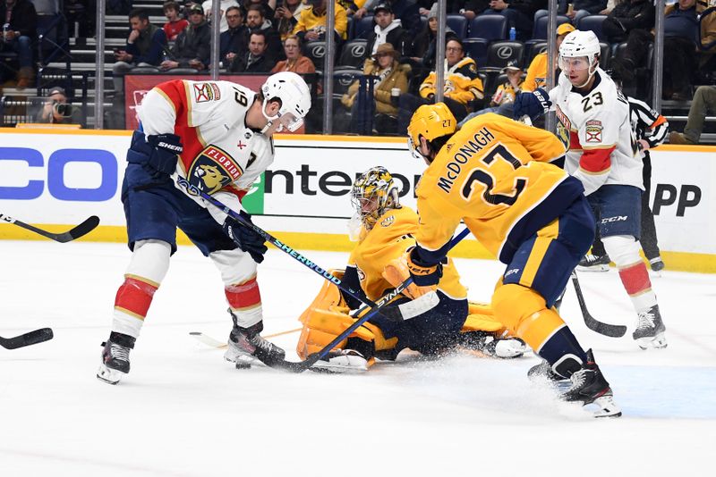 Jan 22, 2024; Nashville, Tennessee, USA; Florida Panthers left wing Matthew Tkachuk (19) tries to shoot a rebound against Nashville Predators goaltender Juuse Saros (74) during the second period at Bridgestone Arena. Mandatory Credit: Christopher Hanewinckel-USA TODAY Sports