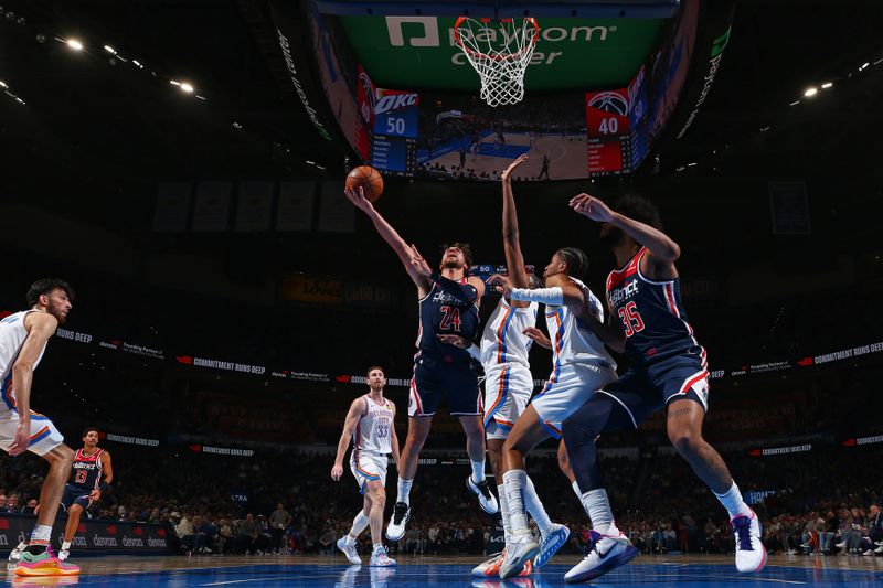 OKLAHOMA CITY, OK - FEBRUARY 23: Corey Kispert #24 of the Washington Wizards drives to the basket during the game against the Oklahoma City Thunder on February 23, 2024 at Paycom Arena in Oklahoma City, Oklahoma. NOTE TO USER: User expressly acknowledges and agrees that, by downloading and or using this photograph, User is consenting to the terms and conditions of the Getty Images License Agreement. Mandatory Copyright Notice: Copyright 2024 NBAE (Photo by Zach Beeker/NBAE via Getty Images)