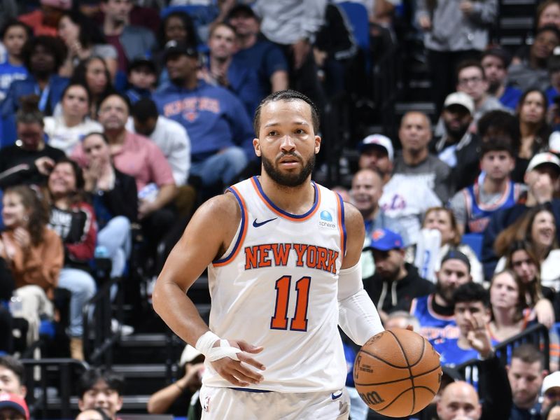 ORLANDO, FL - FEBRUARY 14: Jalen Brunson #11 of the New York Knicks dribbles the ball during the game against the Orlando Magic on February 14, 2024 at the Kia Center in Orlando, Florida. NOTE TO USER: User expressly acknowledges and agrees that, by downloading and or using this photograph, User is consenting to the terms and conditions of the Getty Images License Agreement. Mandatory Copyright Notice: Copyright 2024 NBAE (Photo by Fernando Medina/NBAE via Getty Images)