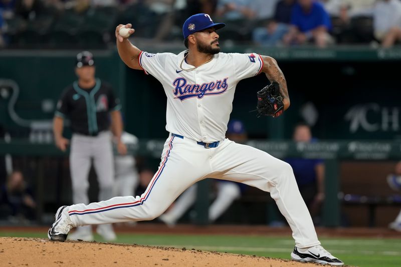 May 29, 2024; Arlington, Texas, USA; Texas Rangers relief pitcher Jesus Tinoco (59) delivers a pitch to the Arizona Diamondbacks during the seventh inning at Globe Life Field. Mandatory Credit: Jim Cowsert-USA TODAY Sports