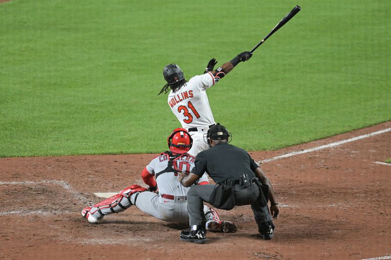 Sep 11, 2023; Baltimore, Maryland, USA; Baltimore Orioles center fielder Cedric Mullins (31) swings through a fifth inning grand slam off St. Louis Cardinals starting pitcher Dakota Hudson (not pictured)  at Oriole Park at Camden Yards. Mandatory Credit: Tommy Gilligan-USA TODAY Sports