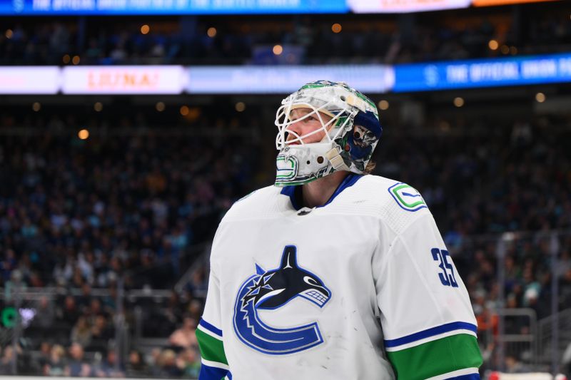 Feb 22, 2024; Seattle, Washington, USA; Vancouver Canucks goaltender Thatcher Demko (35) during the second period against the Seattle Kraken at Climate Pledge Arena. Mandatory Credit: Steven Bisig-USA TODAY Sports