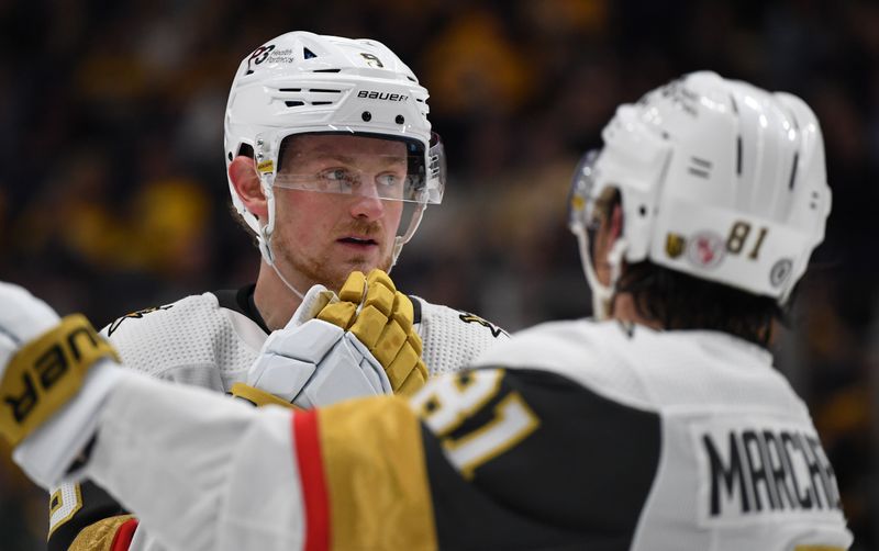 Apr 4, 2023; Nashville, Tennessee, USA; Vegas Golden Knights center Jack Eichel (9) talks with right wing Jonathan Marchessault (81) before a face off during the second period against the Nashville Predators at Bridgestone Arena. Mandatory Credit: Christopher Hanewinckel-USA TODAY Sports