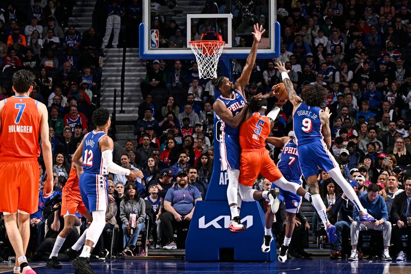 PHILADELPHIA, PA - APRIL 2: Joel Embiid #21 of the Philadelphia 76ers blocks the basket during the game against the Oklahoma City Thunder on April 2, 2024 at the Wells Fargo Center in Philadelphia, Pennsylvania NOTE TO USER: User expressly acknowledges and agrees that, by downloading and/or using this Photograph, user is consenting to the terms and conditions of the Getty Images License Agreement. Mandatory Copyright Notice: Copyright 2024 NBAE (Photo by David Dow/NBAE via Getty Images)