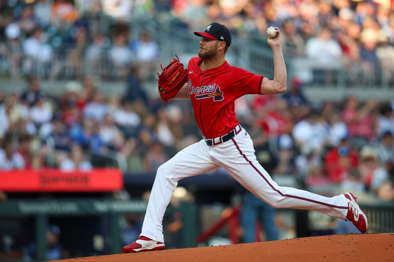 Jun 14, 2024; Atlanta, Georgia, USA; Atlanta Braves starting pitcher Chris Sale (51) throws against the Tampa Bay Rays in the first inning at Truist Park. Mandatory Credit: Brett Davis-USA TODAY Sports
