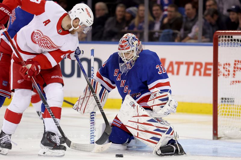 Nov 29, 2023; New York, New York, USA; New York Rangers goaltender Igor Shesterkin (31) makes a save against Detroit Red Wings center Andrew Copp (18) during the second period at Madison Square Garden. Mandatory Credit: Brad Penner-USA TODAY Sports