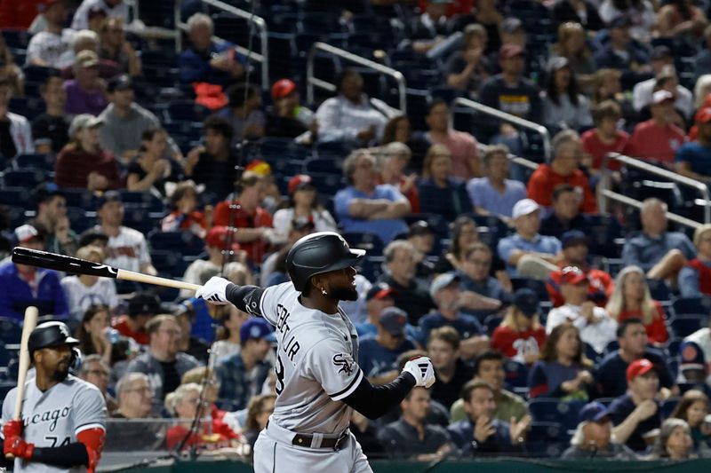 Sep 18, 2023; Washington, District of Columbia, USA; Chicago White Sox center fielder Luis Robert Jr. (88) hits a three run home run against the Washington Nationals during the fifth inning at Nationals Park. Mandatory Credit: Geoff Burke-USA TODAY Sports