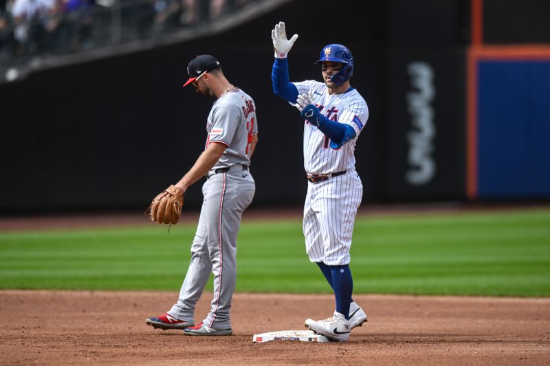 Sep 21, 2025; New York City, New York, USA; New York Mets catcher Luis Torrens (13) reacts after hitting a double against the Washington Nationals during the third inning at Citi Field. Mandatory Credit: John Jones-Imagn Images